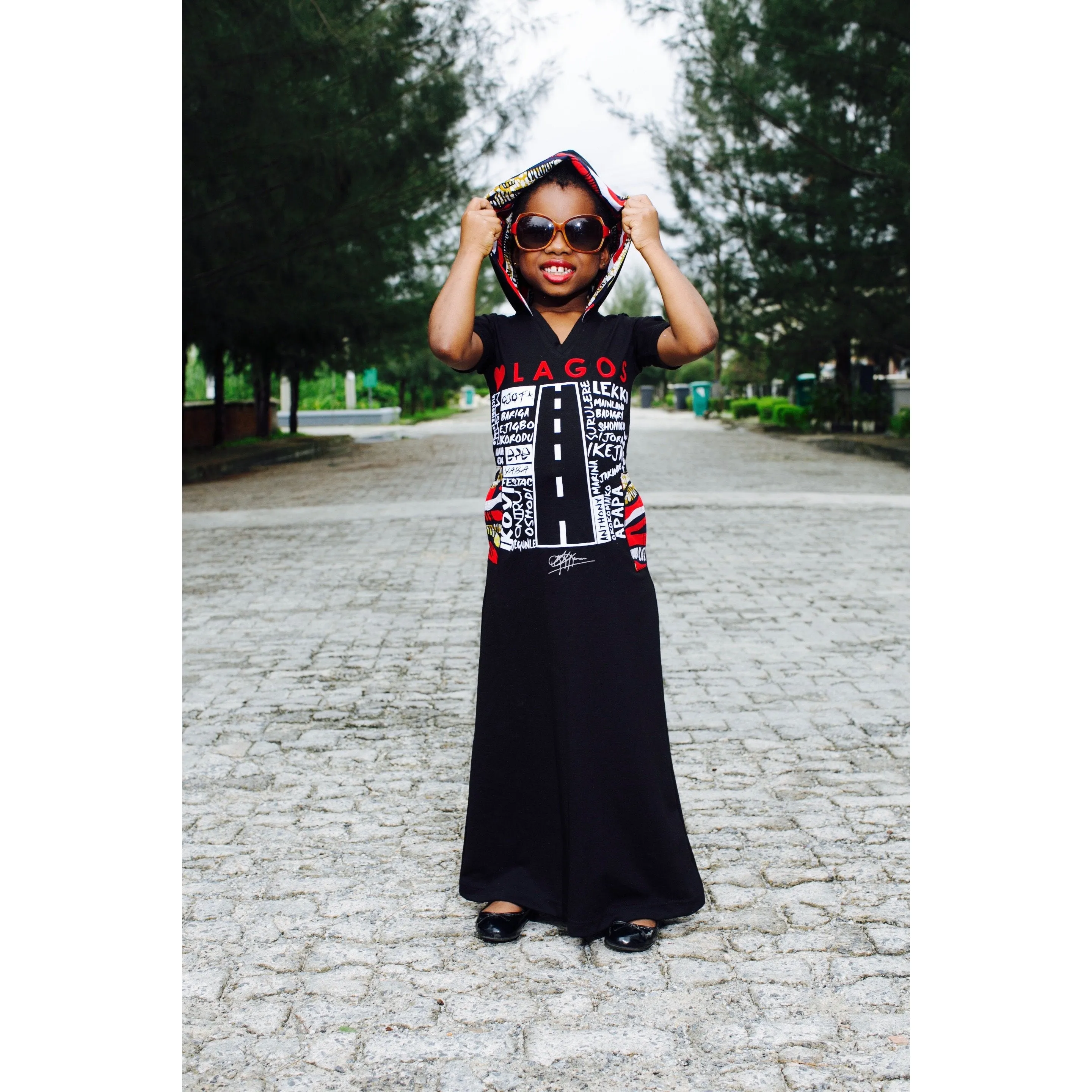 KIDS: LUV LAGOS ANKARA BLACK HOODED MAXI DRESS