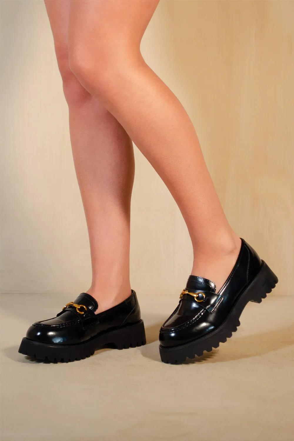 MURIEL CHUNKY SOLE SLIP ON LOAFERS WITH METAL DETAIL IN BLACK PATENT